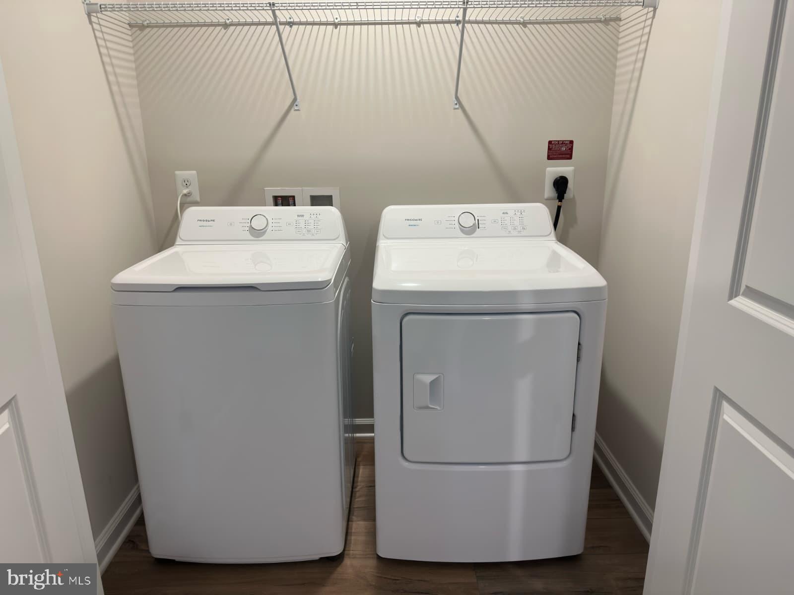 1256 Red Clover Lane, Unit 149 Ranson, WV 25438 - Photo 14 of 17 a utility room with dryer and washer