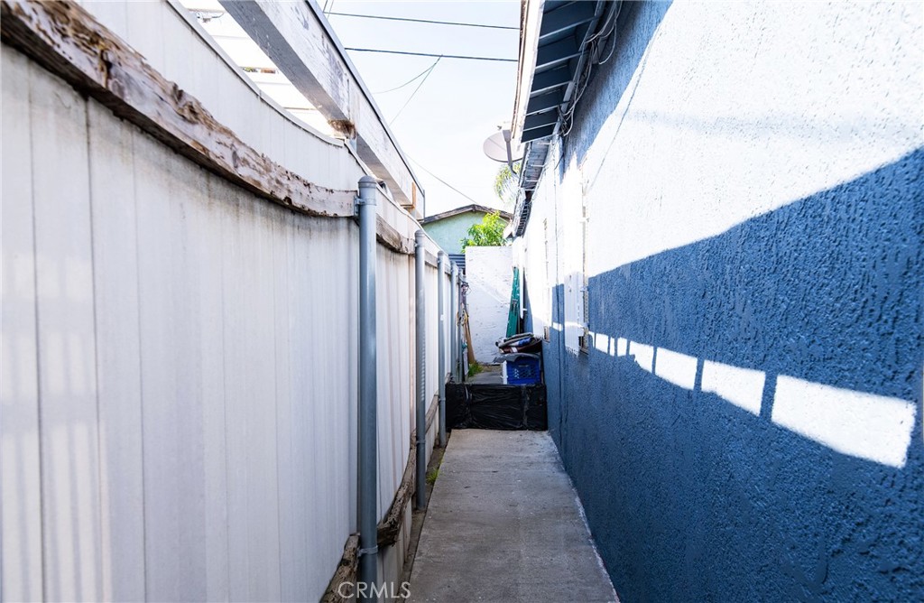 2121 East Shauer Street Compton, CA 90222 - Photo 11 of 30 a view of a balcony with wooden floor