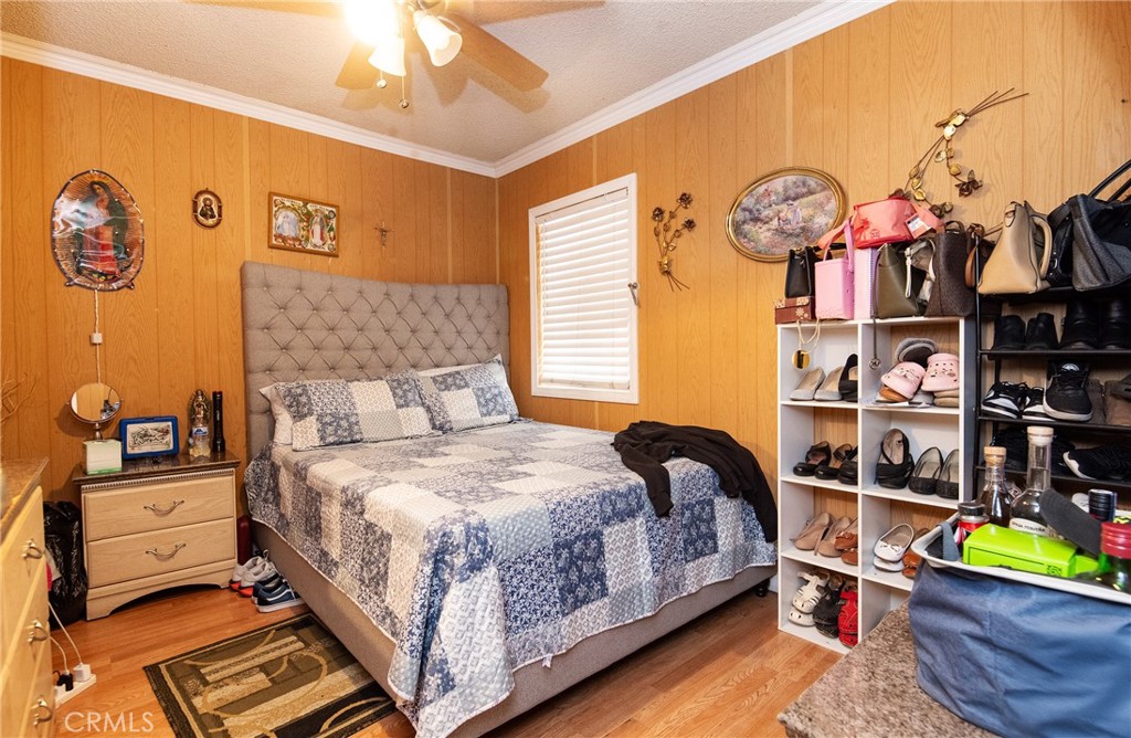 2121 East Shauer Street Compton, CA 90222 - Photo 21 of 30 a bedroom with a bed and dresser