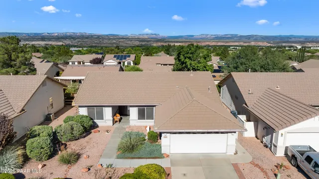 swimming pool view with a seating space