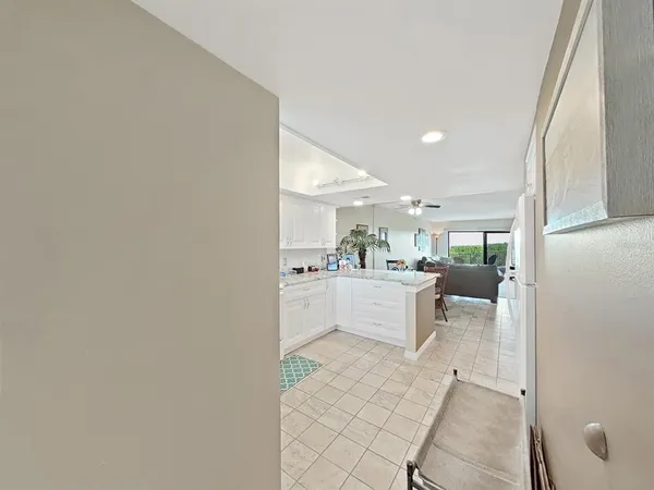 a view of a living room and dining room