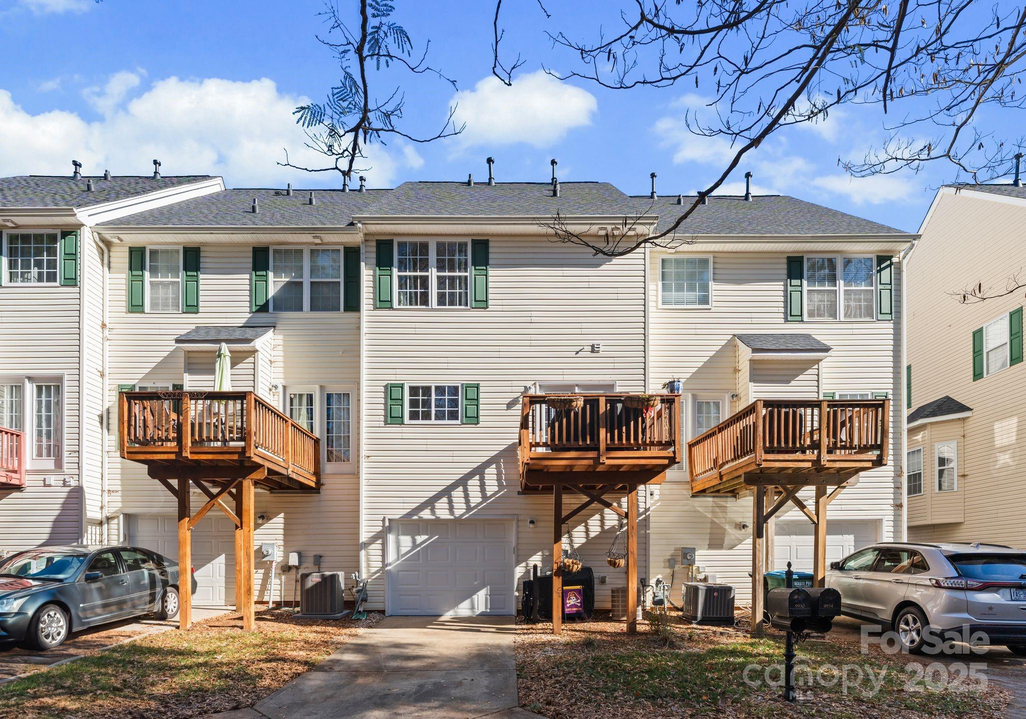 9930 Treeside Lane Matthews, NC 28105 - Photo 2 of 20 a front view of a house with a street