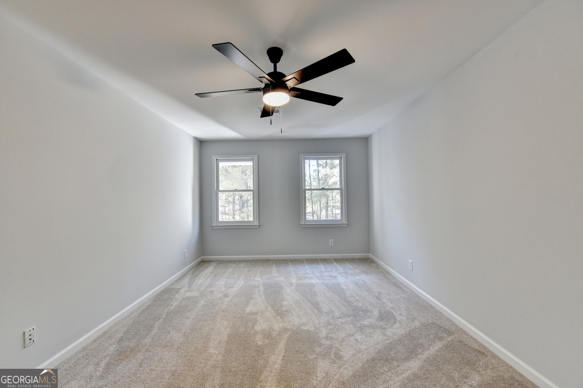 590 Manning Gin Road Monroe, GA 30656 - Photo 42 of 82 a view of an empty room with a window