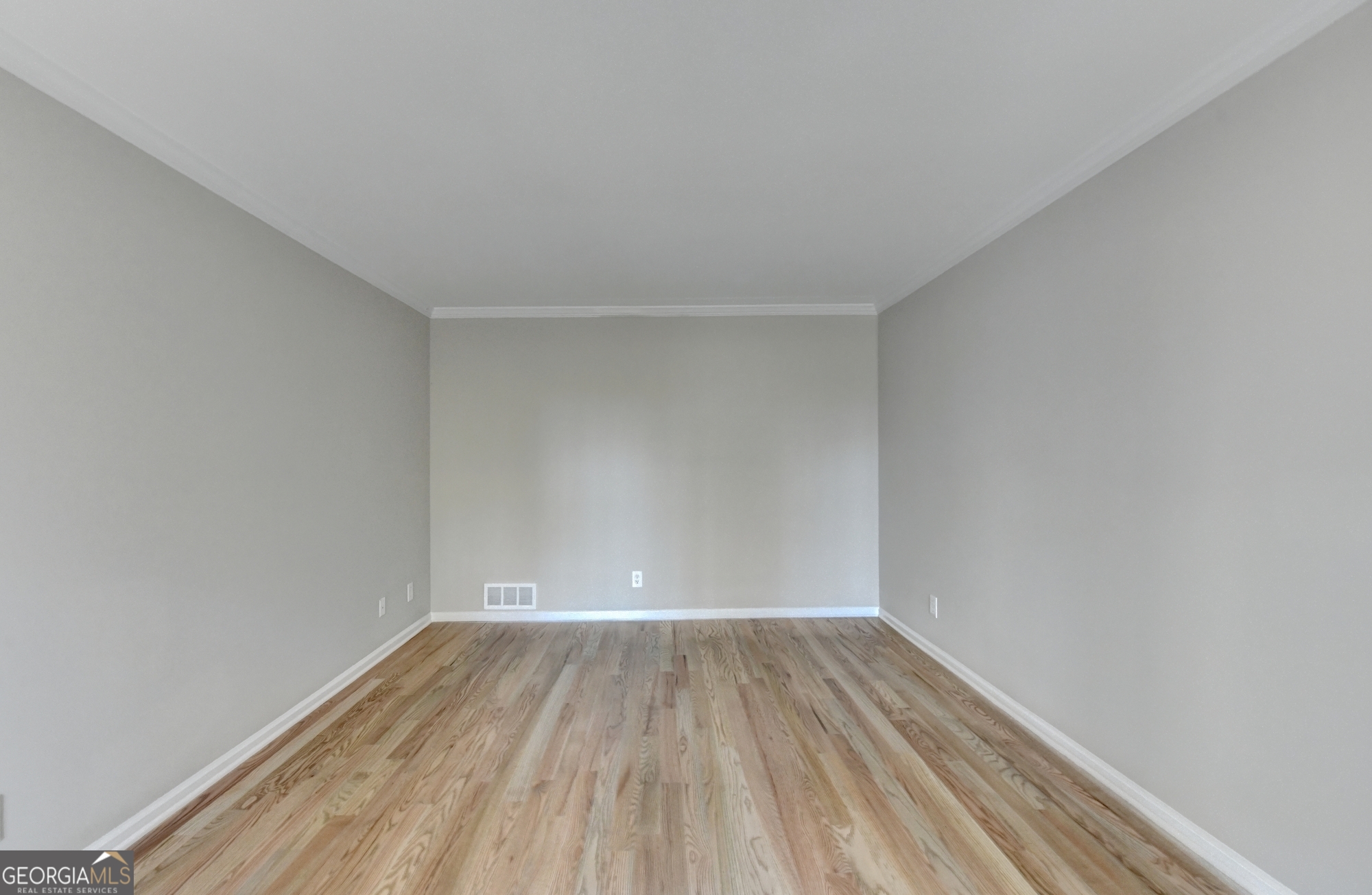 590 Manning Gin Road Monroe, GA 30656 - Photo 6 of 82 a view of room with wooden floor
