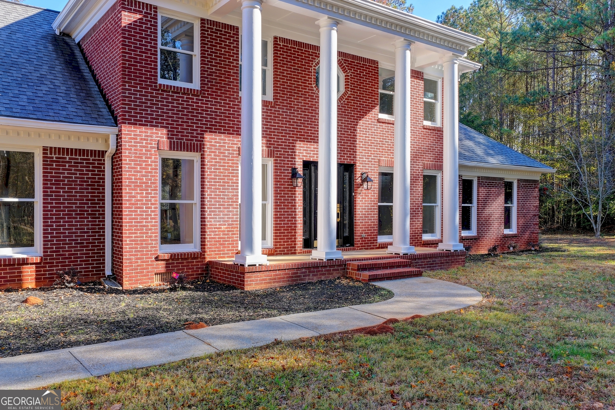 590 Manning Gin Road Monroe, GA 30656 - Photo 72 of 82 a front view of a house with a yard