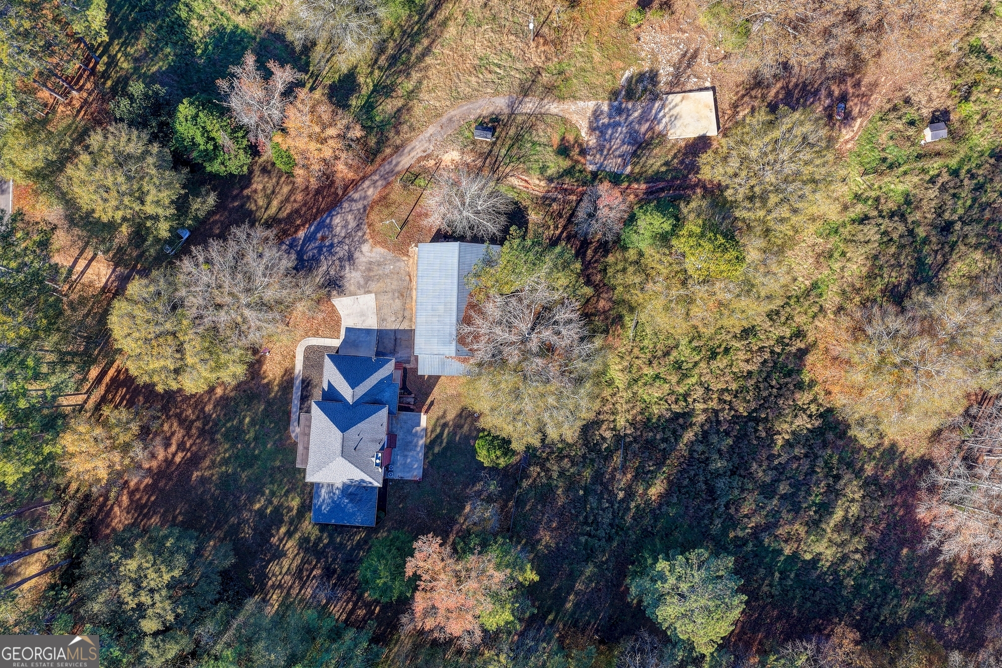 590 Manning Gin Road Monroe, GA 30656 - Photo 81 of 82 an aerial view of a house with a yard and garden