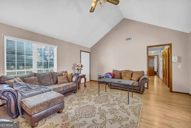 a living room with furniture and a couch