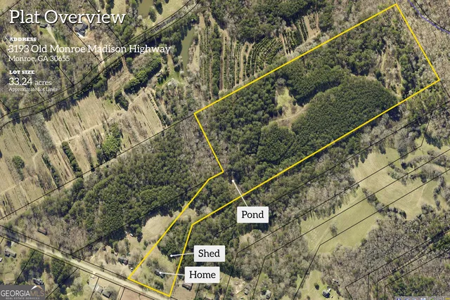 a view of a sign board with yard