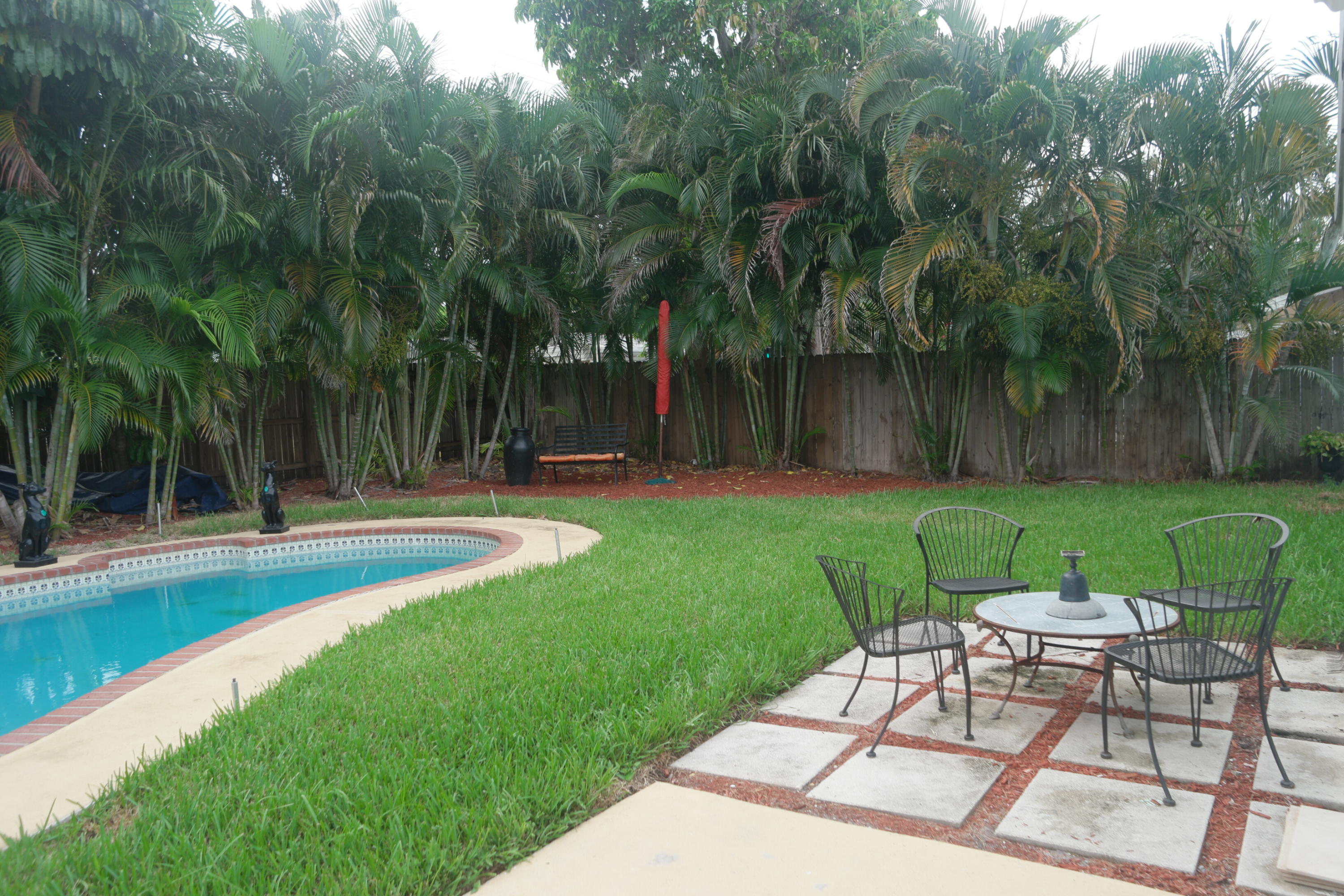 1413 High Ridge Road Lake Worth, FL 33461 - Photo 22 of 29 Backyard Patio