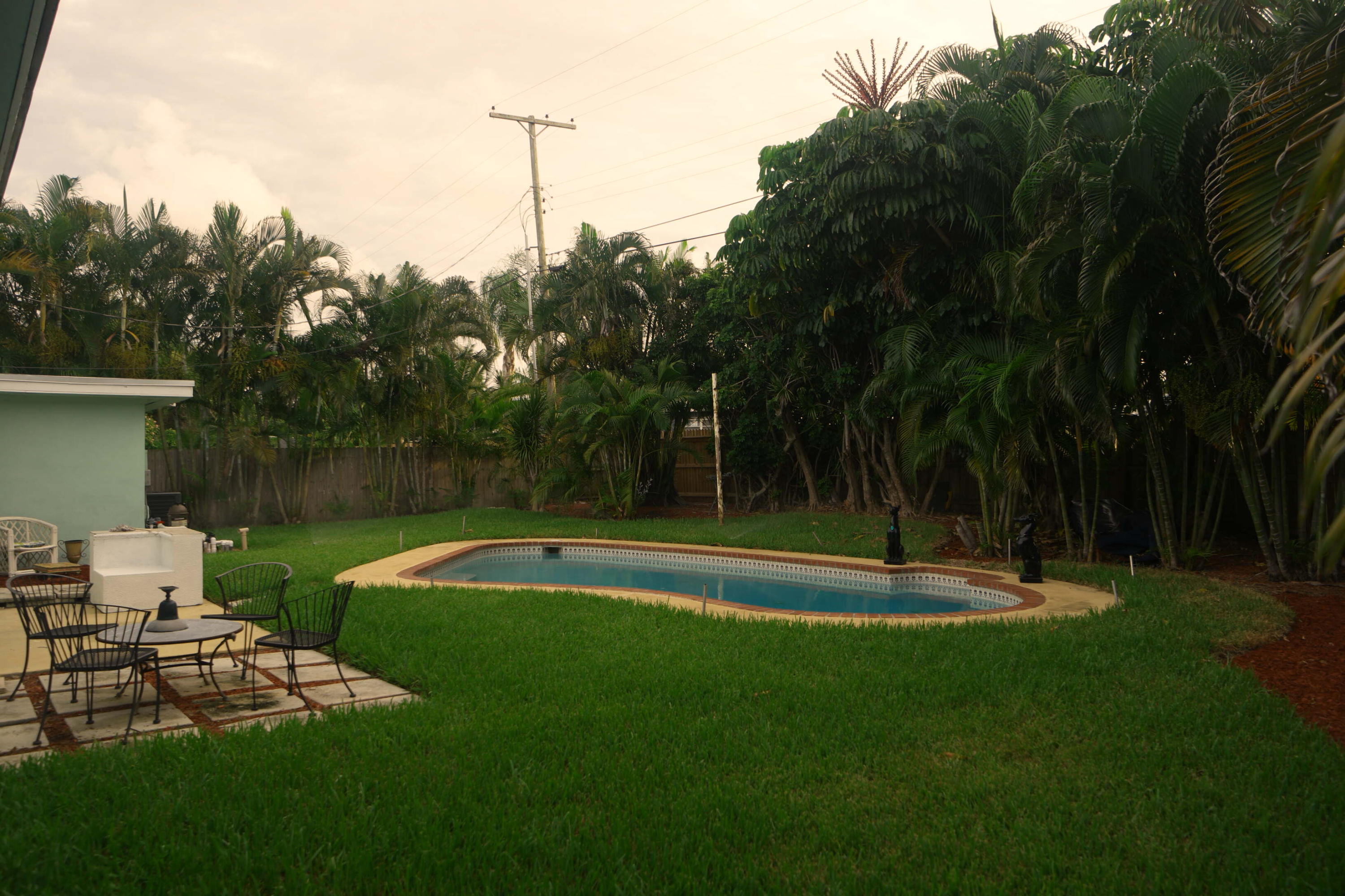 1413 High Ridge Road Lake Worth, FL 33461 - Photo 23 of 29 Backyard & Pool
