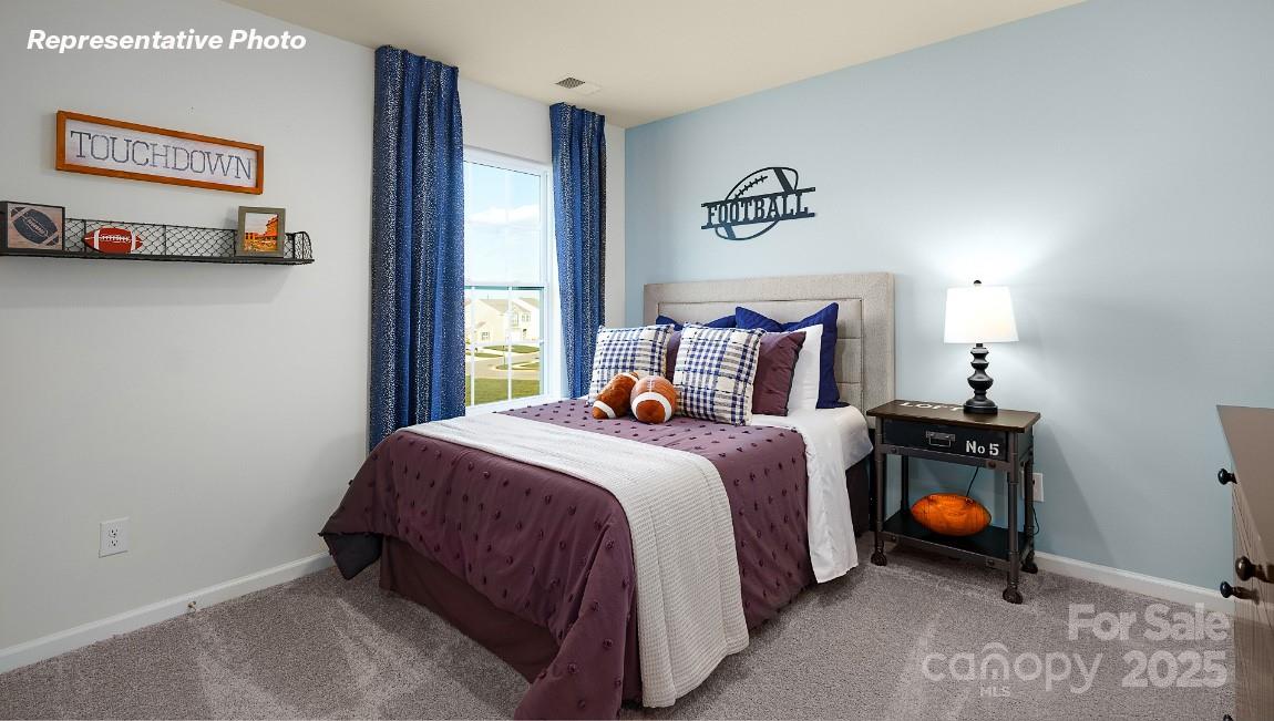 1023 Two Brothers Lane York, SC 29745 - Photo 25 of 30 a bedroom with a bed and a window