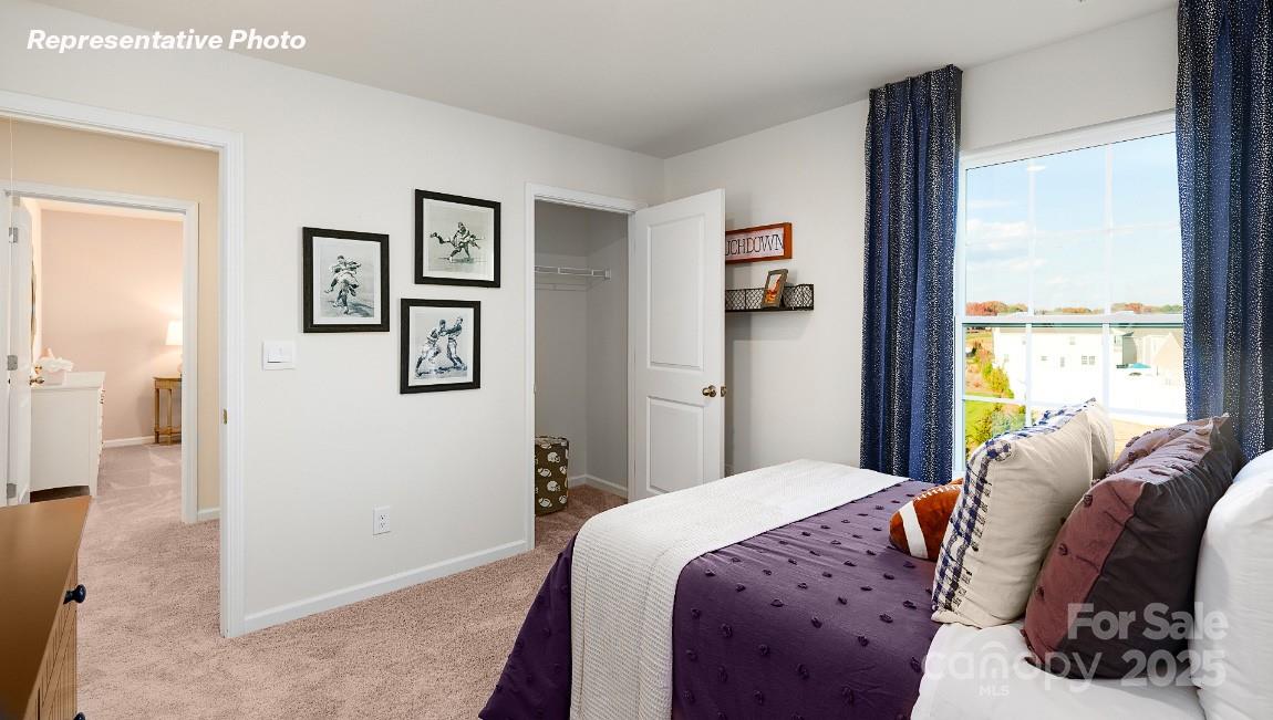 1023 Two Brothers Lane York, SC 29745 - Photo 26 of 30 a bedroom with a large bed and a window