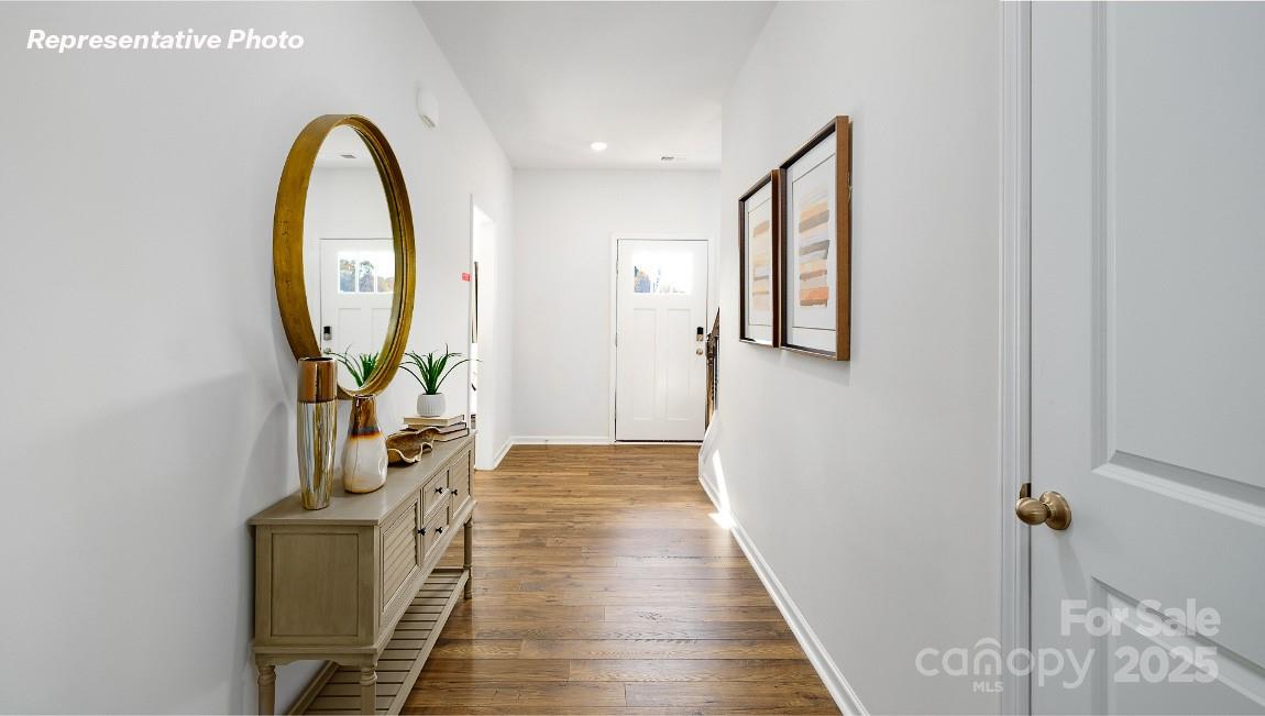 1023 Two Brothers Lane York, SC 29745 - Photo 3 of 30 a view of a hallway with wooden floor and entryway