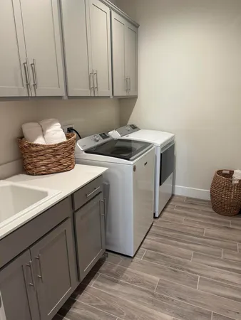 a kitchen with a sink and cabinets