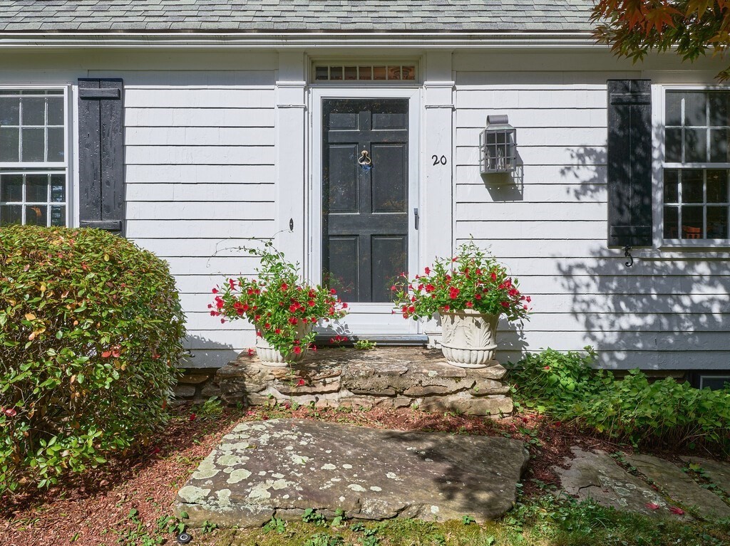 20 Manhattan Road Worcester, MA 01602 - Photo 2 of 41 a front view of a house with a yard