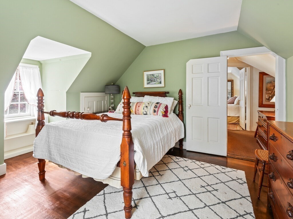 20 Manhattan Road Worcester, MA 01602 - Photo 24 of 41 a bedroom with a bed and a mirror