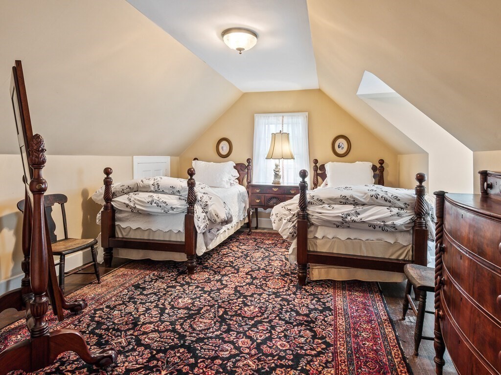 20 Manhattan Road Worcester, MA 01602 - Photo 25 of 41 a bedroom with a bed and wooden floor