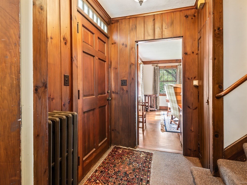 20 Manhattan Road Worcester, MA 01602 - Photo 4 of 41 a view of a hallway with wooden floor and windows