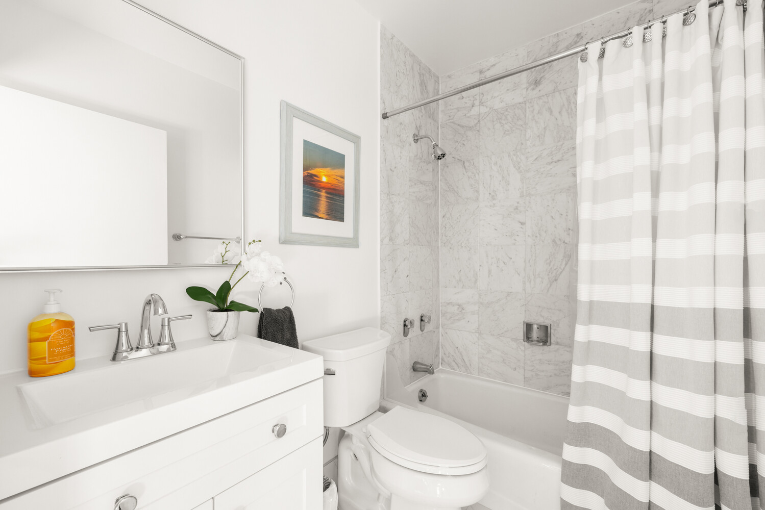 515 East 79th Street, Unit 4E Manhattan, NY 10075 - Photo 8 of 10 a bathroom with a sink a toilet and shower