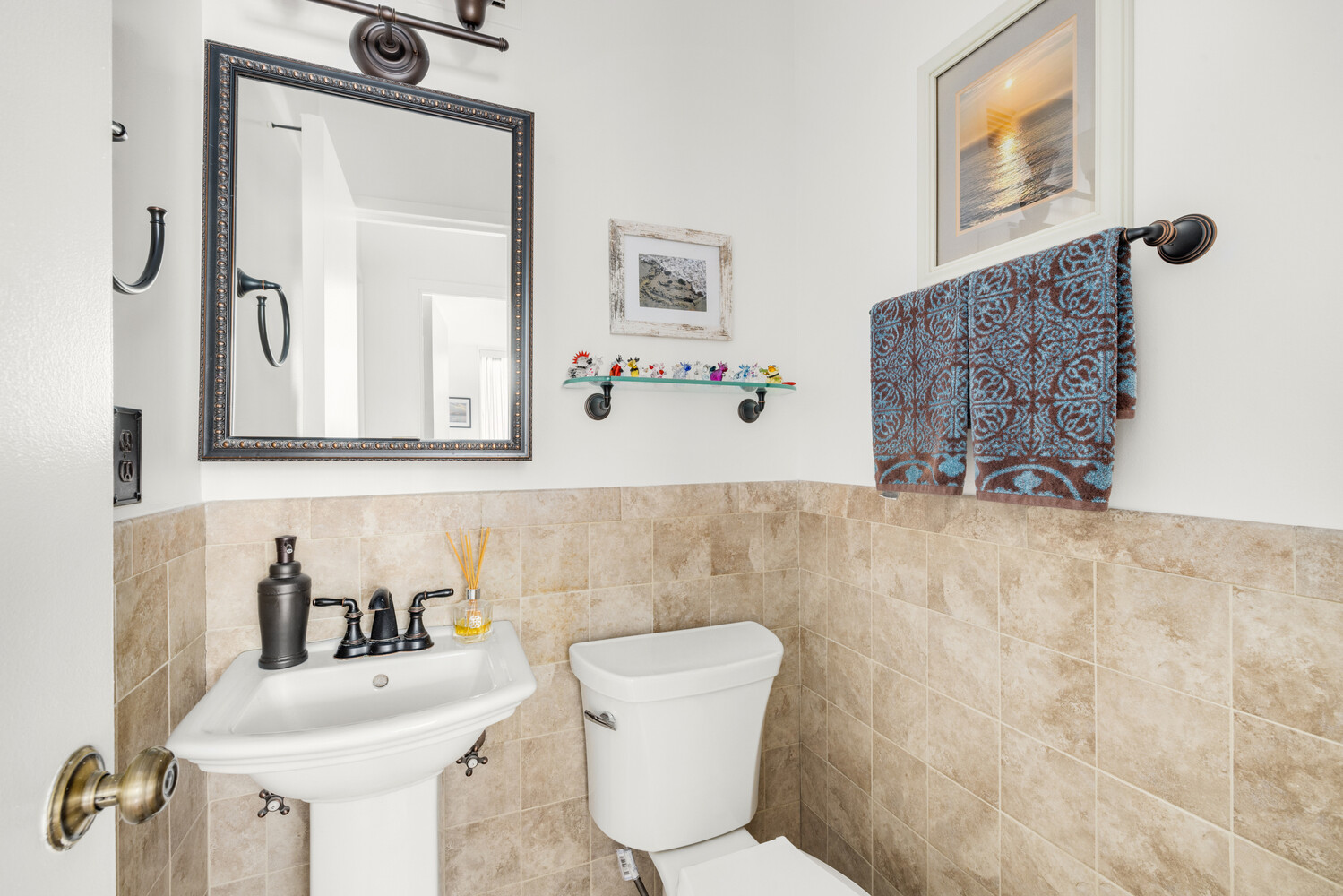 515 East 79th Street, Unit 4E Manhattan, NY 10075 - Photo 9 of 10 a bathroom with a toilet sink and mirror