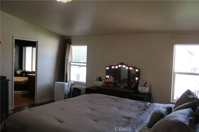 a bathroom with a bathtub and a sink