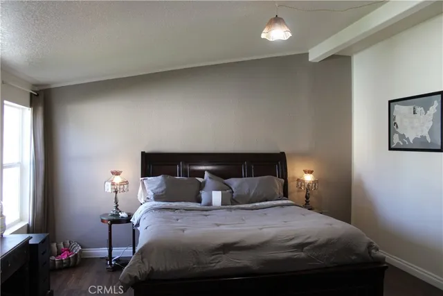 a kitchen with stainless steel appliances a stove a sink and a refrigerator