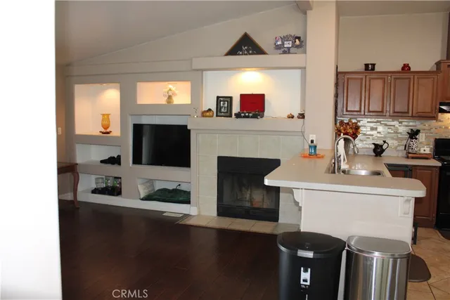 a view of a porch with chairs and backyard