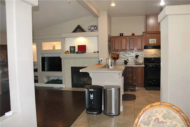 a front view of a house with a yard table and chairs