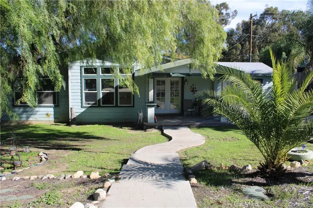 a view of a garage with a bike and car