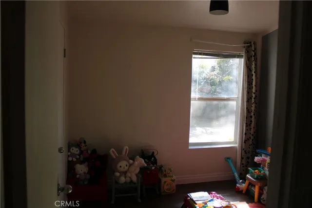 a room with toys and a window