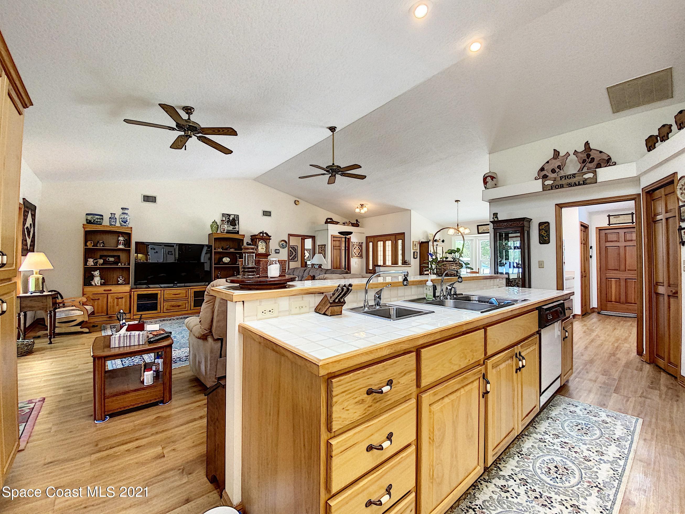 1351 Grant Road Grant Valkaria, FL 32949 - Photo 17 of 36 310 Kitchen