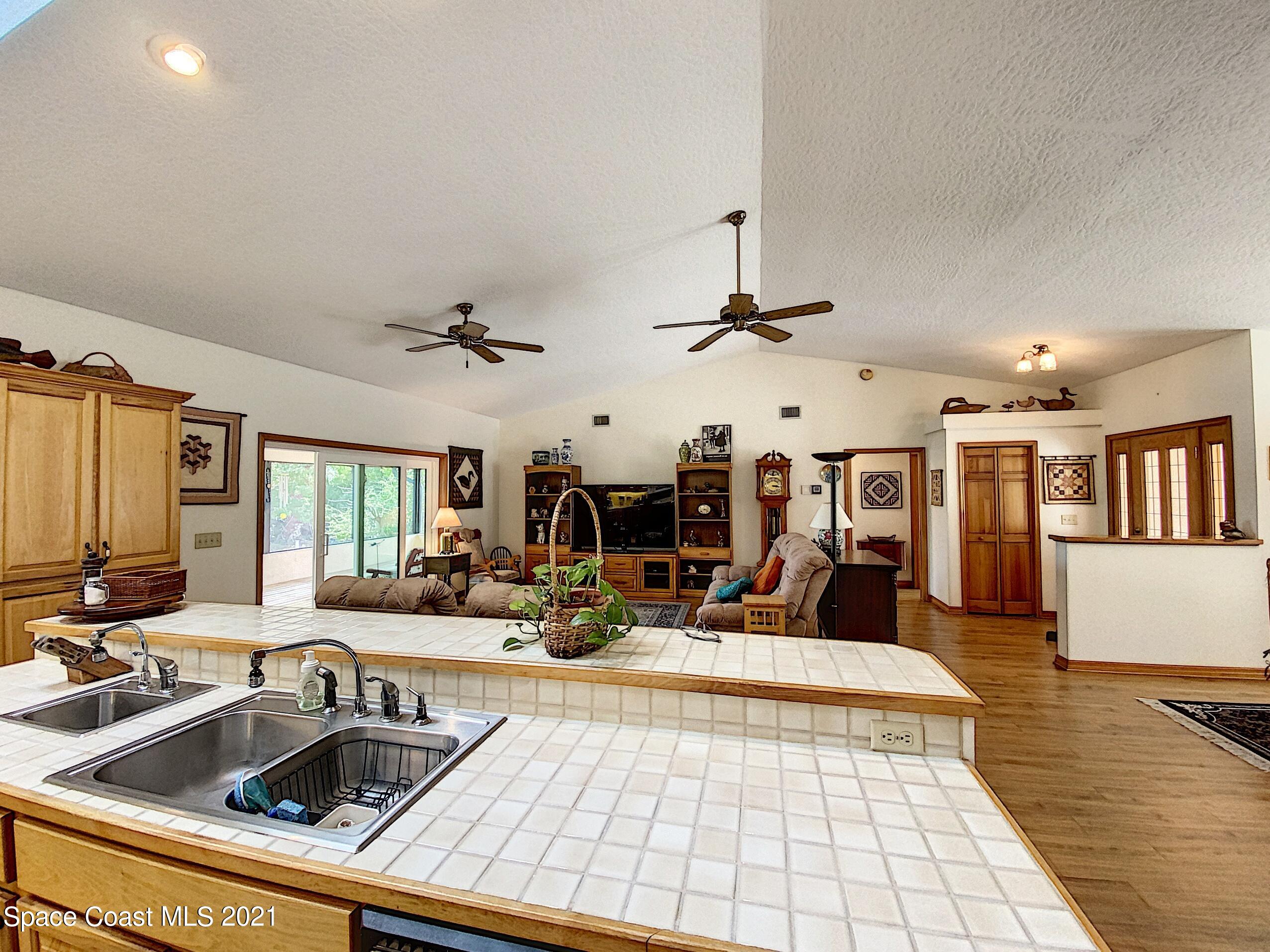 1351 Grant Road Grant Valkaria, FL 32949 - Photo 18 of 36 320 Kitchen
