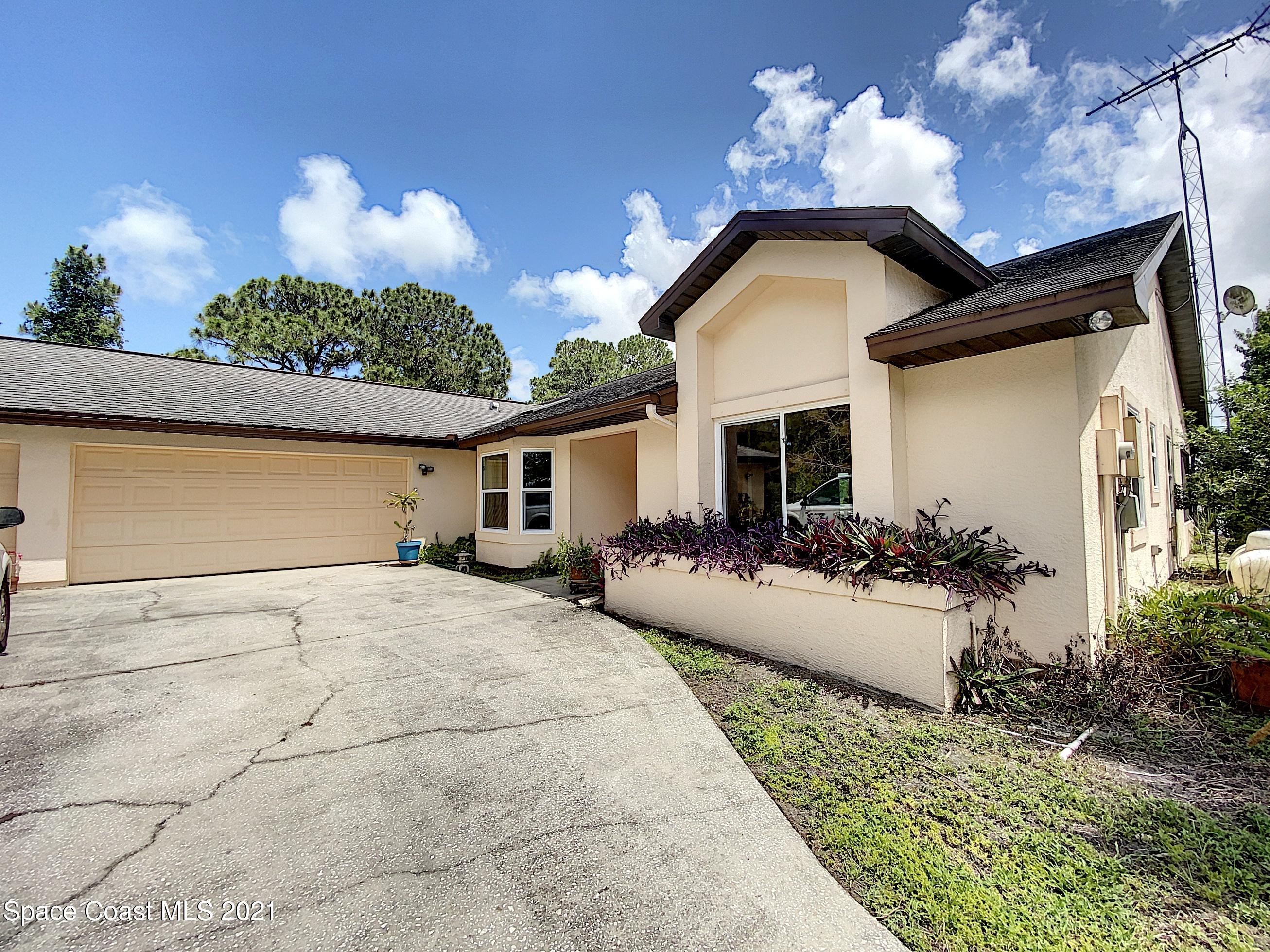 1351 Grant Road Grant Valkaria, FL 32949 - Photo 4 of 36 50 Front of House