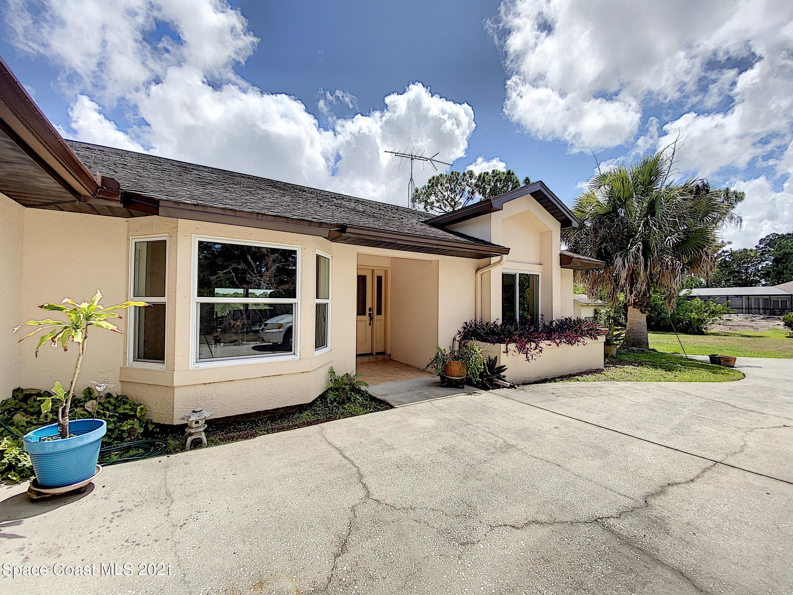 1351 Grant Road Grant Valkaria, FL 32949 - Photo 5 of 36 60 Front of House