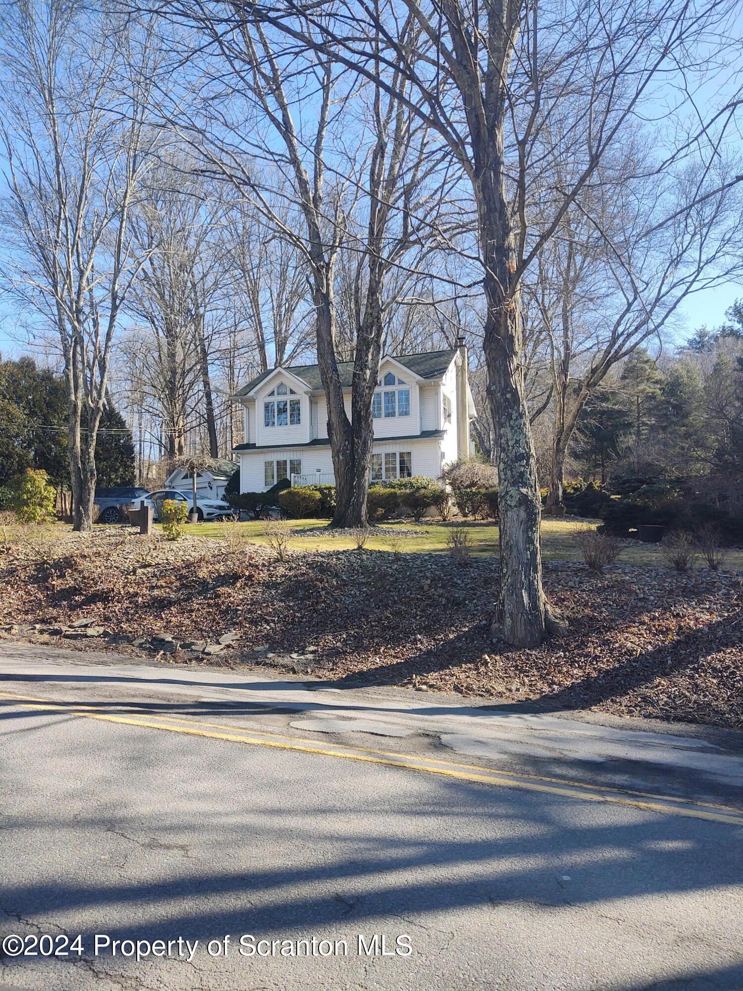 2401 Chase Road Shavertown, PA 18708 - Photo 4 of 19 a view of a yard with a house