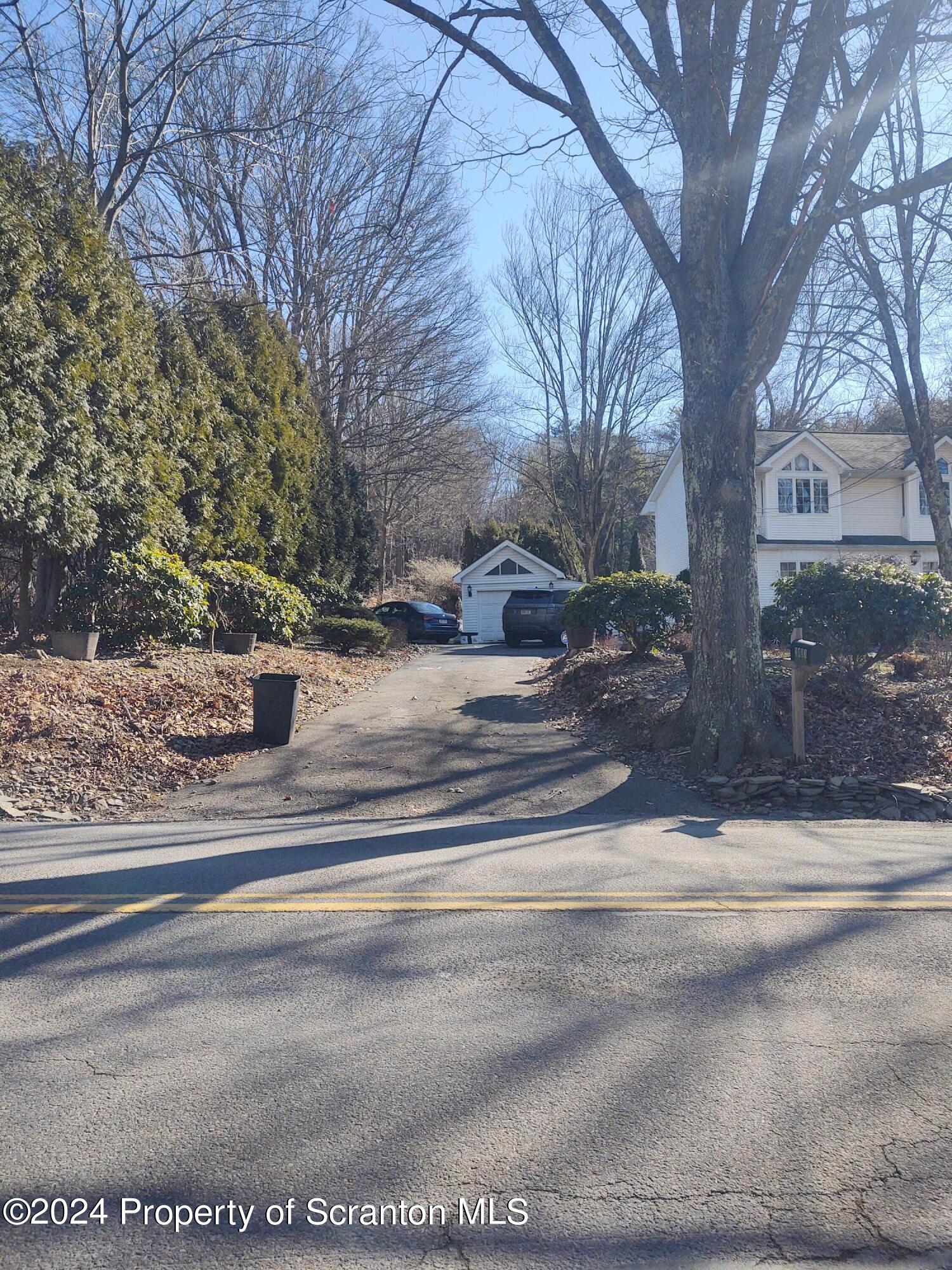 2401 Chase Road Shavertown, PA 18708 - Photo 7 of 19 a view of street with houses