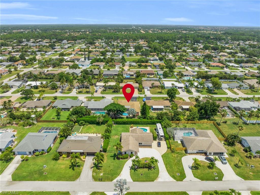 130 Mentor Drive Naples, FL 34110 - Photo 42 of 47 a view of a city