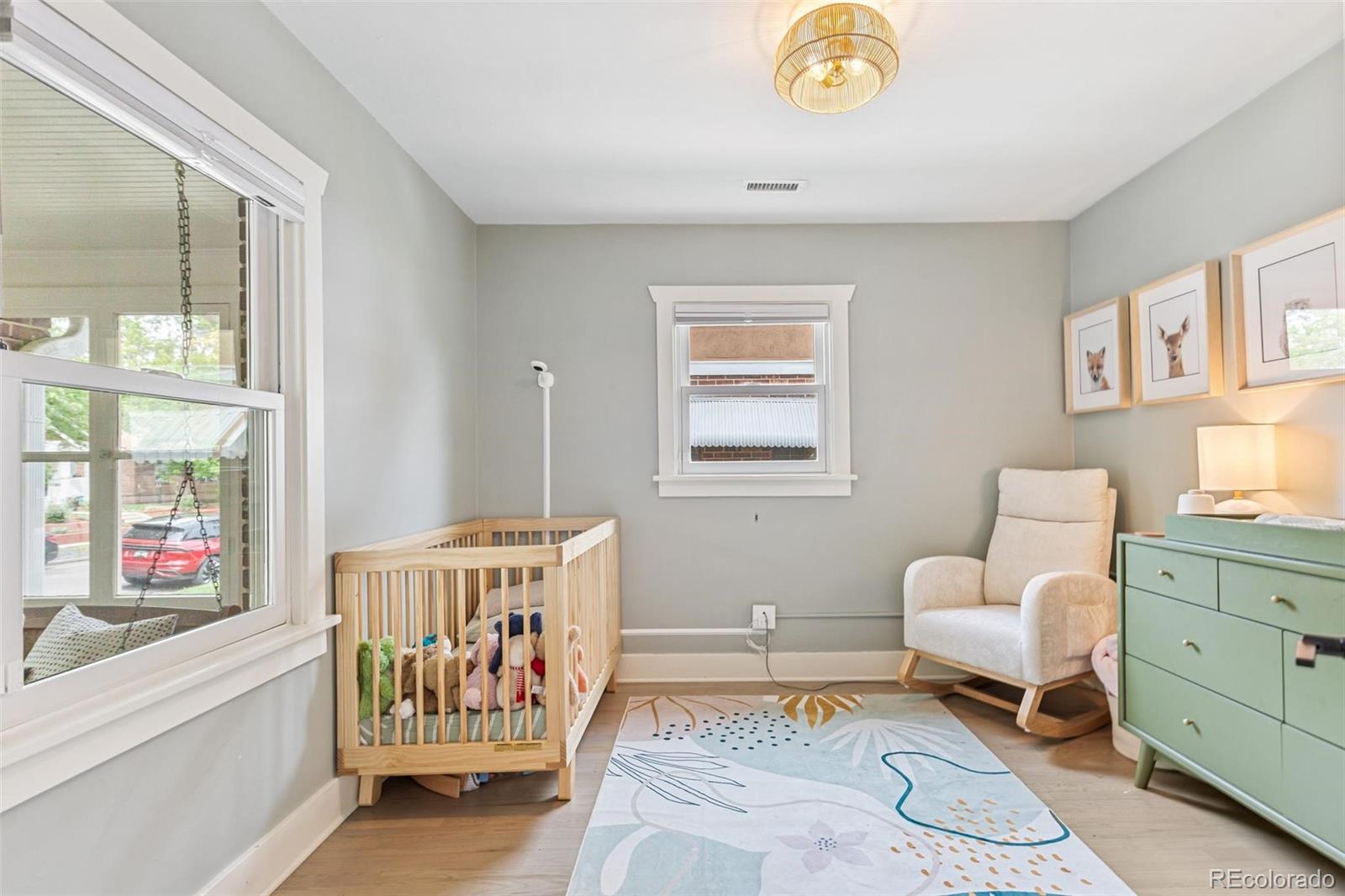 3612 Perry Street Denver, CO 80212 - Photo 21 of 50 a bedroom with furniture and a window