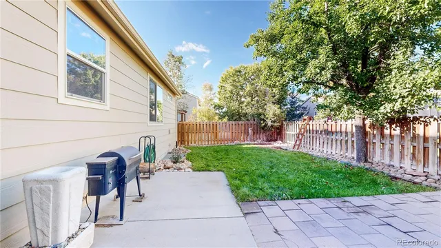 a view of backyard with green space