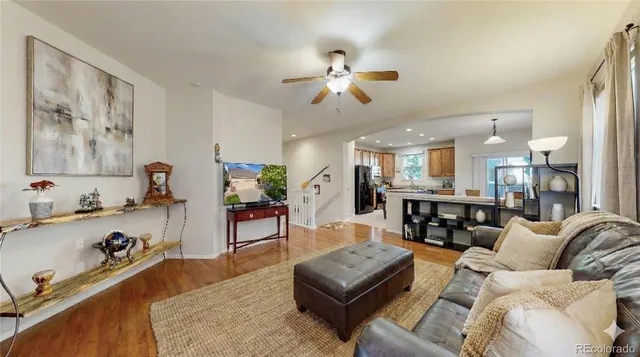 a kitchen with a sink stove and refrigerator
