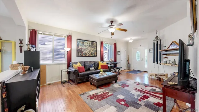 a kitchen with stainless steel appliances granite countertop a refrigerator and a stove