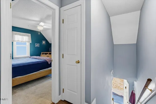 a bedroom with a bed and a cabinets