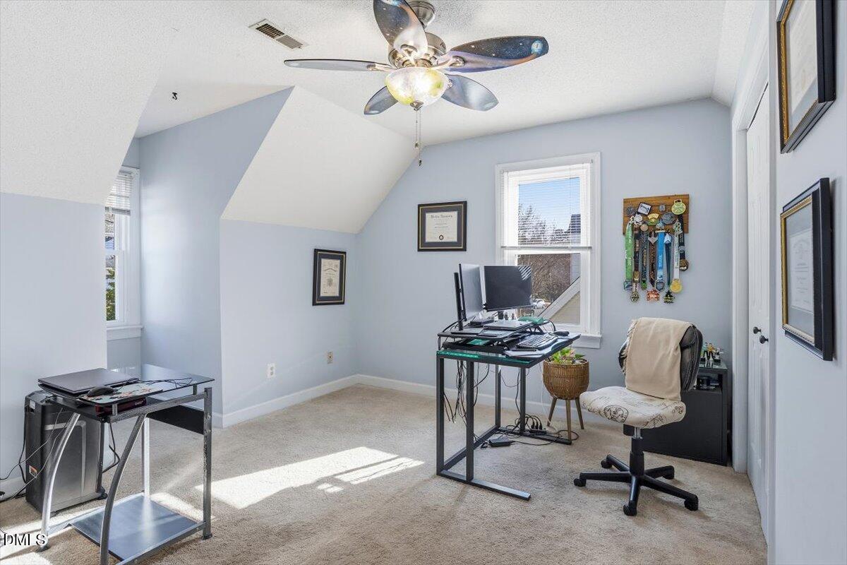 3516 East Jameson Road Raleigh, NC 27604 - Photo 25 of 32 a view of a workspace with furniture