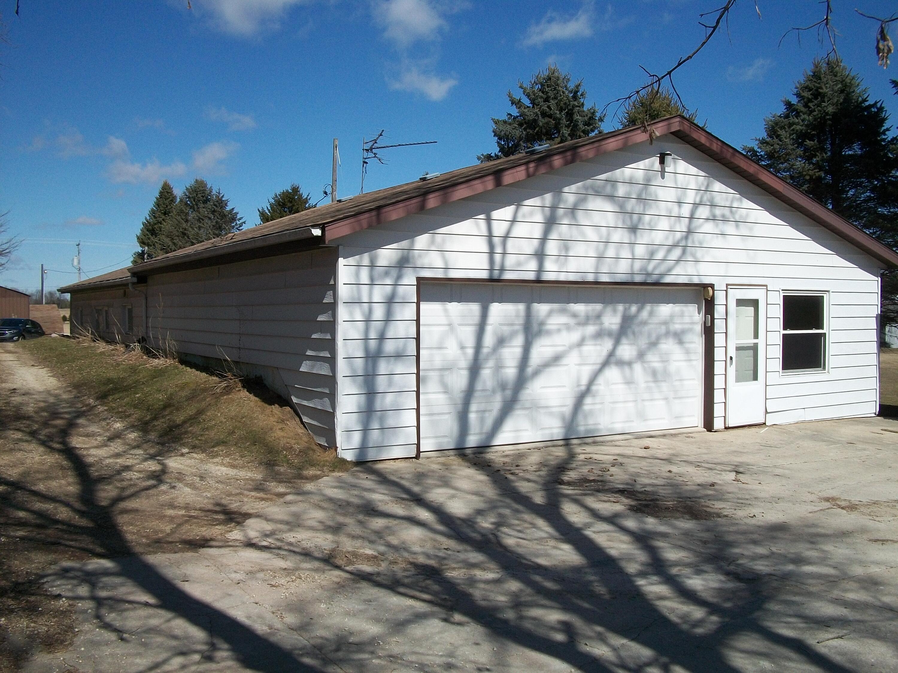 743 County H Farmington, WI 53090 - Photo 4 of 23 garage/back of house