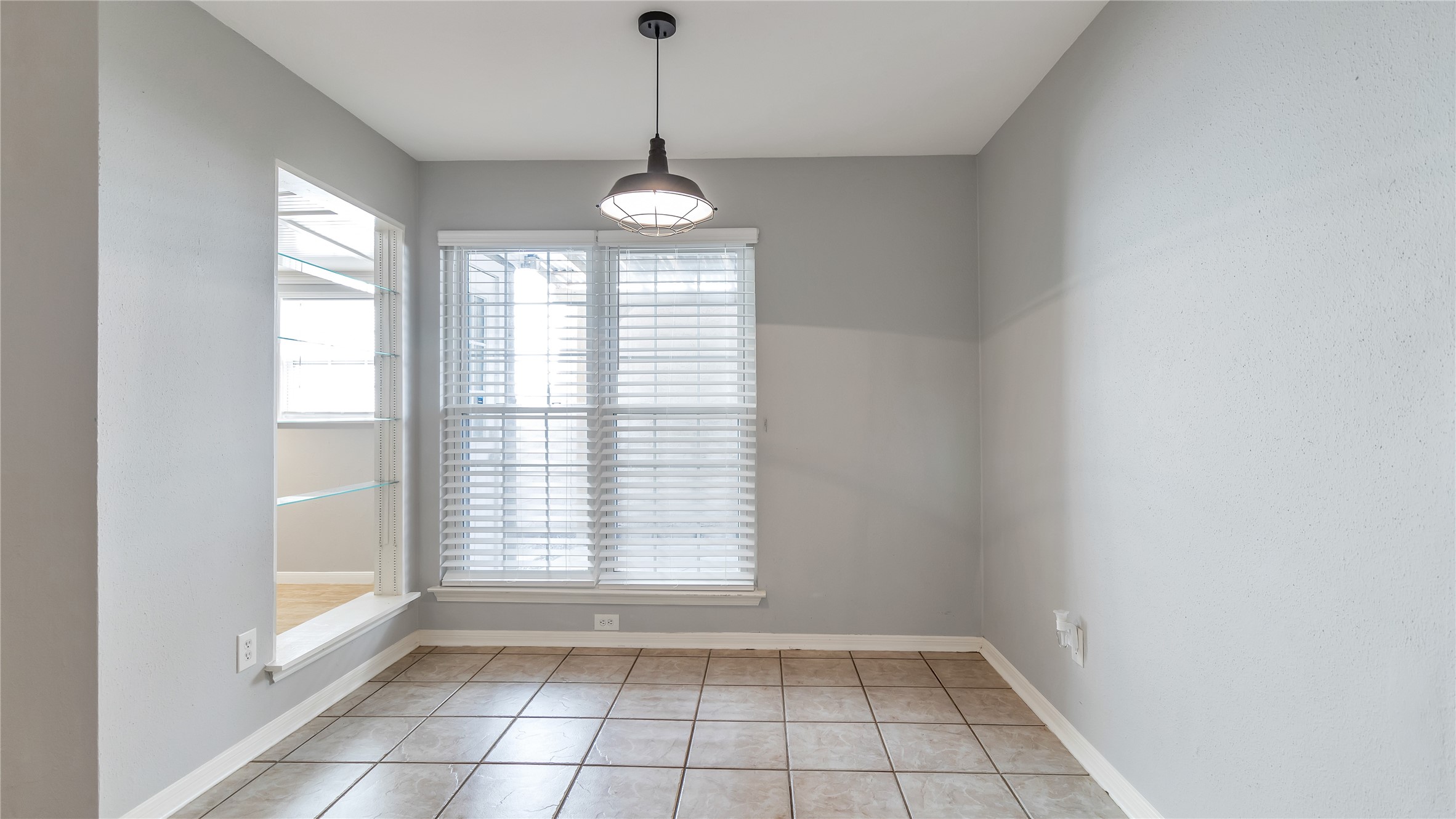 4505 Terrace Manor Drive Houston, TX 77041 - Photo 5 of 19 a view of an empty room with a window