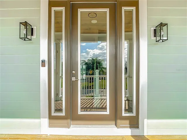 a view of entryway with wooden floor