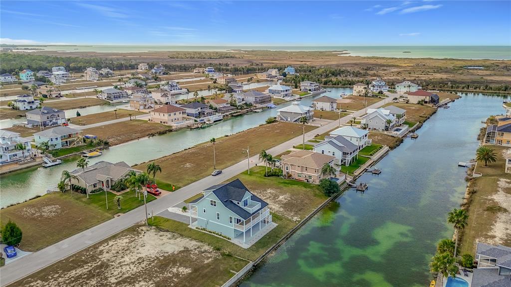 3487 Sheephead Drive Hernando Beach, FL 34607 - Photo 4 of 77 an aerial view of a city with ocean view