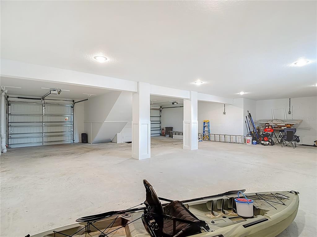 3487 Sheephead Drive Hernando Beach, FL 34607 - Photo 76 of 77 a room with furniture and air hockey table