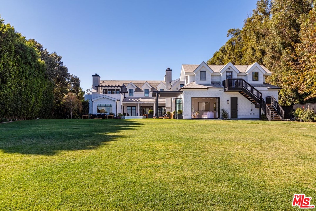 6950 Dume Drive Malibu, CA 90265 - Photo 3 of 24 a house view with a outdoor space
