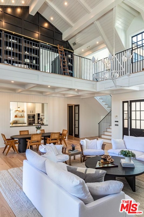 6950 Dume Drive Malibu, CA 90265 - Photo 6 of 24 a living room with furniture kitchen view and a window